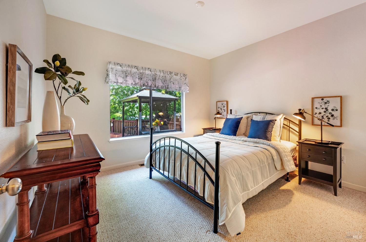 1508 Ronne Drive Santa Rosa, CA 95404 - Photo 18 of 55 a spacious bedroom with a bed and a window