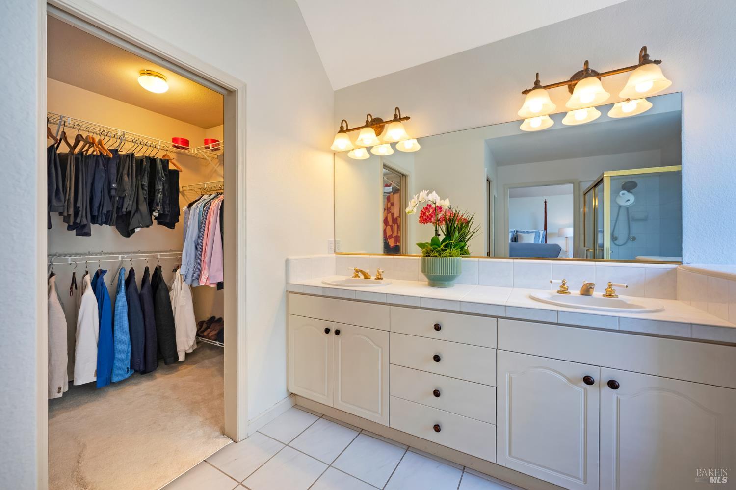 1508 Ronne Drive Santa Rosa, CA 95404 - Photo 30 of 55 a bathroom with a sink double vanity and a mirror
