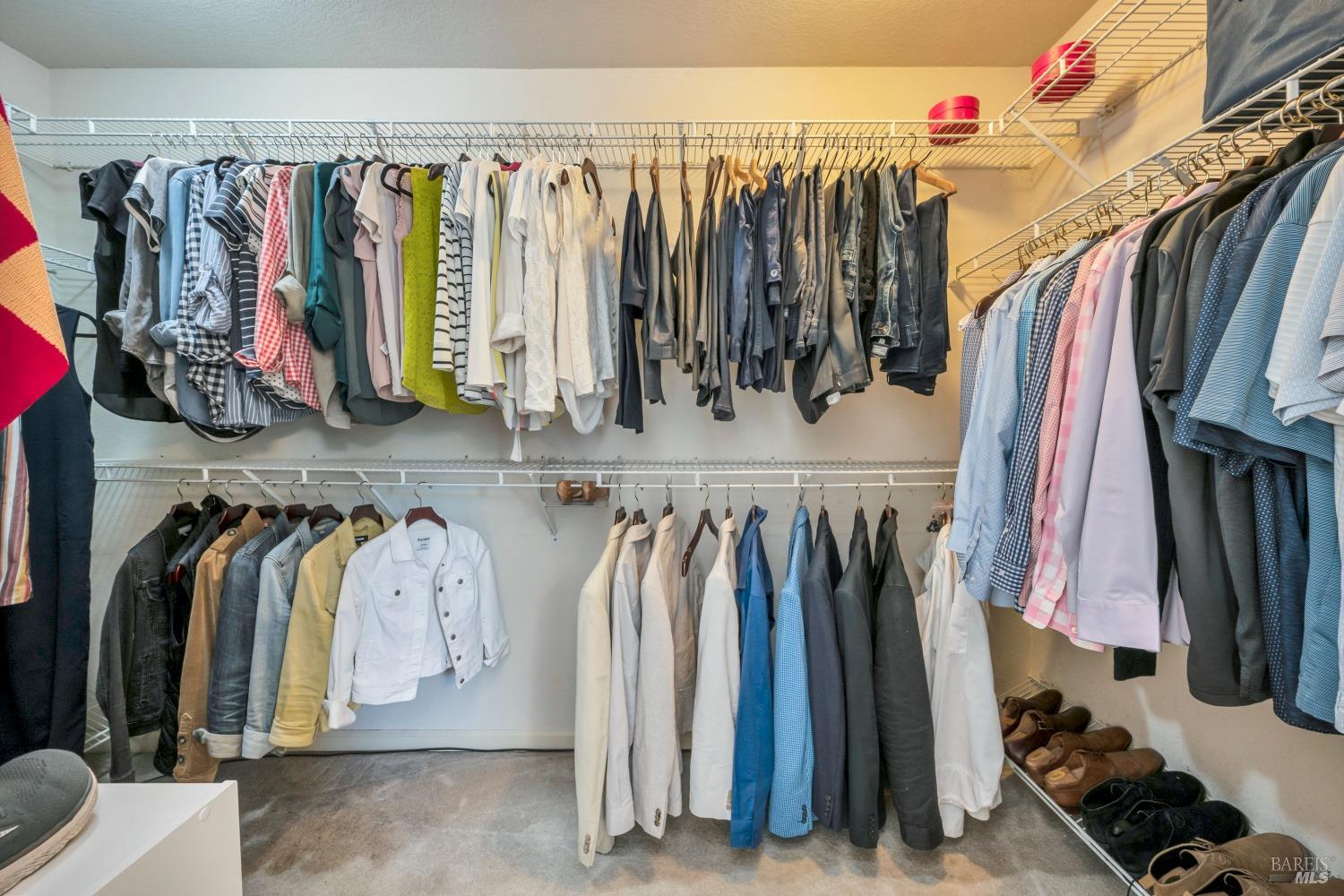 1508 Ronne Drive Santa Rosa, CA 95404 - Photo 31 of 55 a view of walk in closet with clothes and shoes