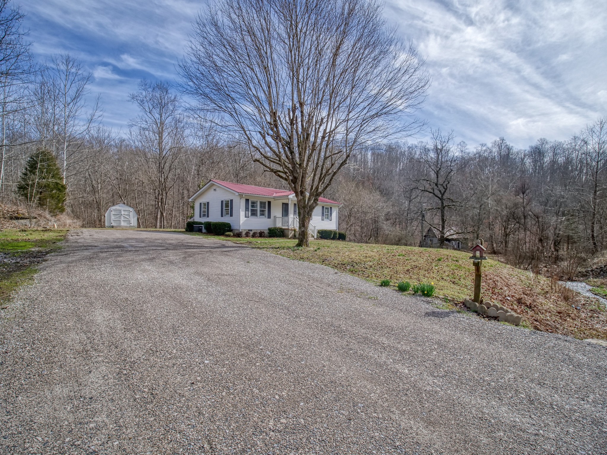 5930 Fox Branch Road Columbia, TN 38401 - Photo 2 of 29 a view of house with yard and trees in the background