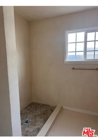 a bathroom with a toilet and a sink