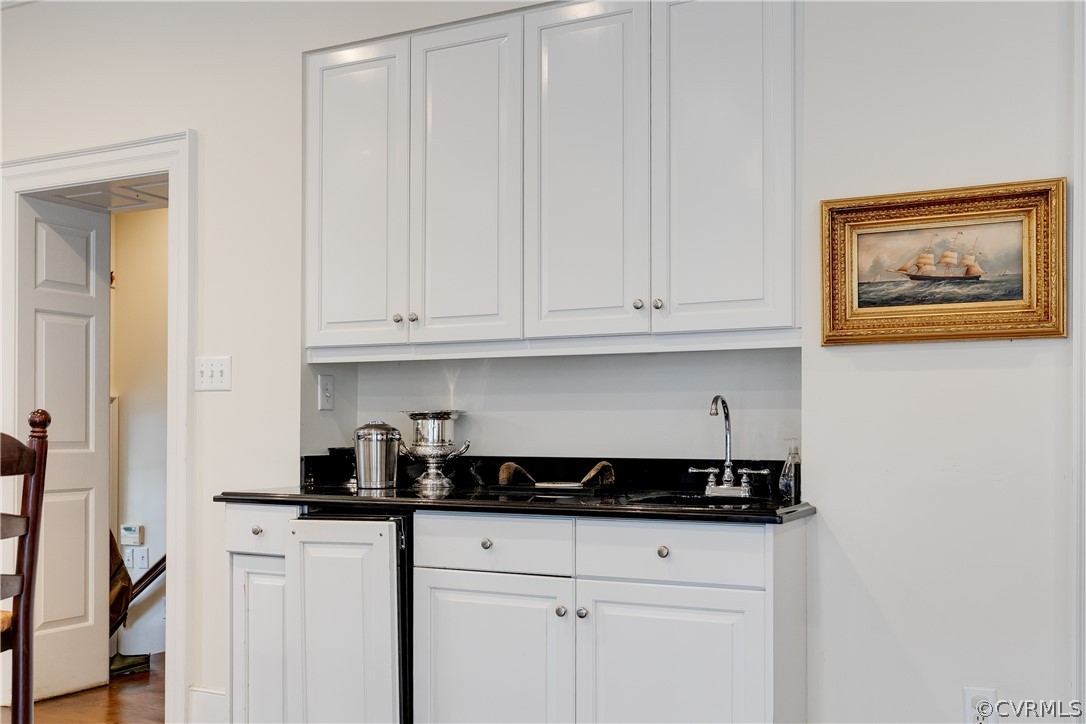 5805 River Road Richmond, VA 23226 - Photo 15 of 47 a kitchen with stainless steel appliances granite countertop white cabinets and a granite counter tops