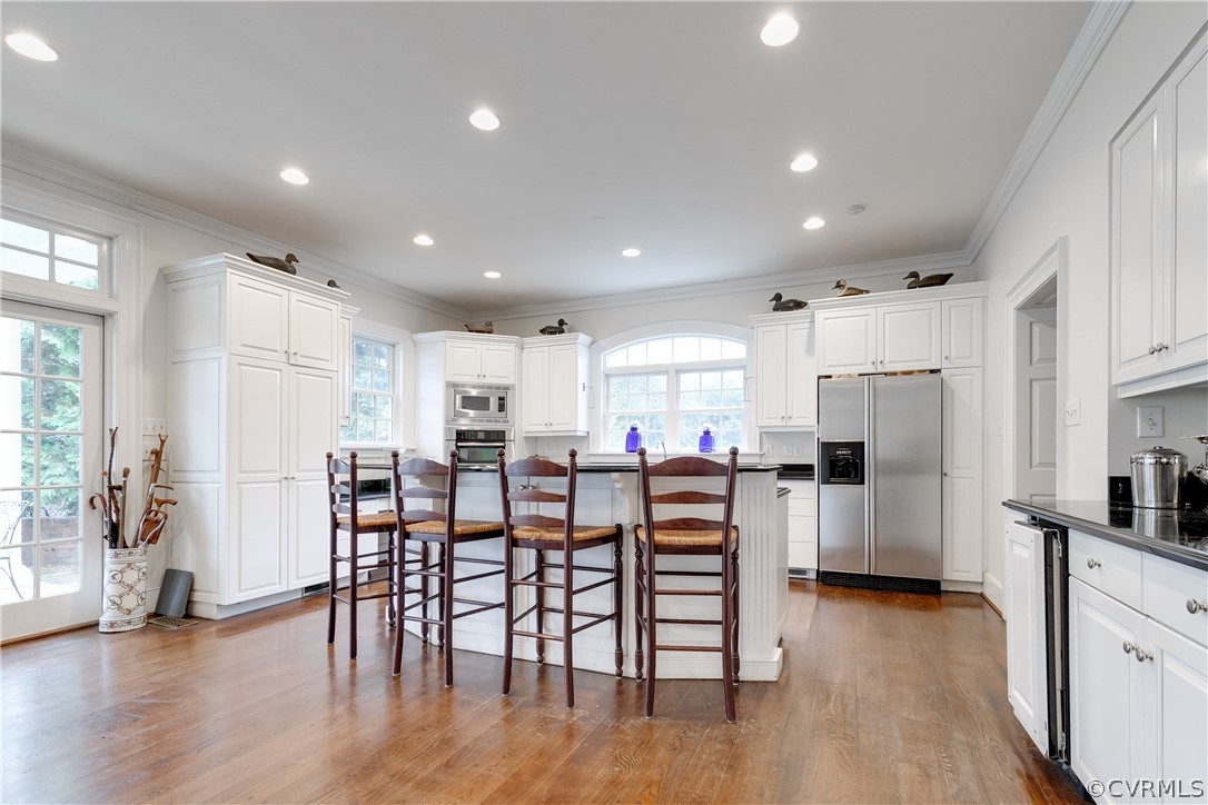 5805 River Road Richmond, VA 23226 - Photo 16 of 47 a view of a dining room with furniture and wooden floor