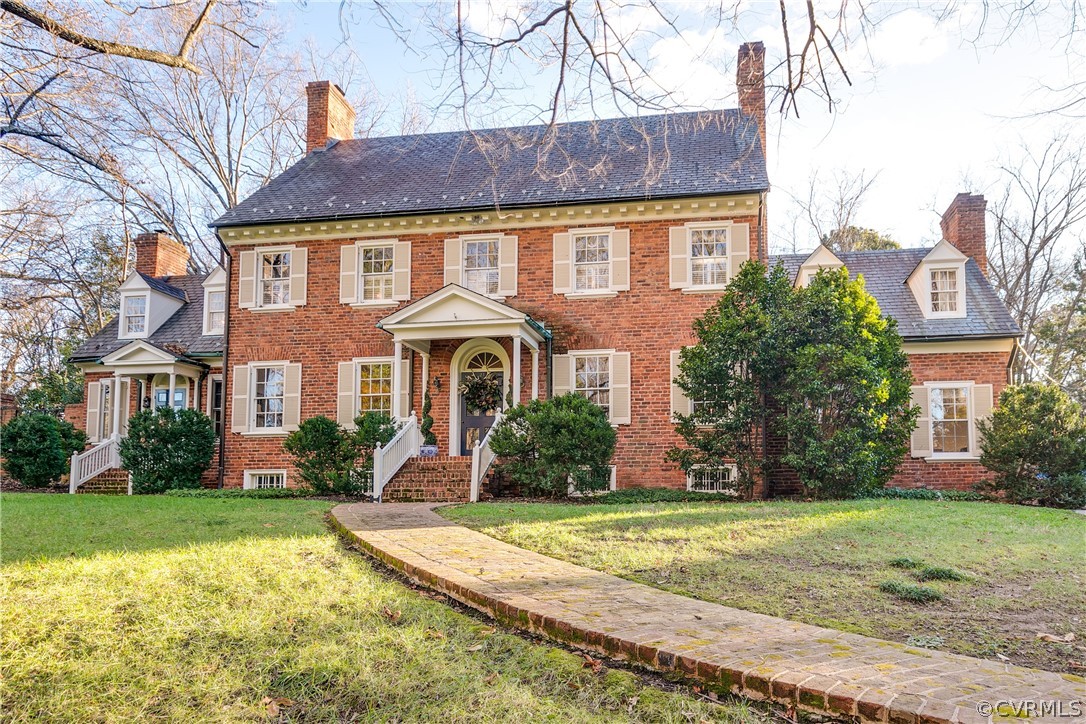 5805 River Road Richmond, VA 23226 - Photo 2 of 47 a front view of a house with a yard