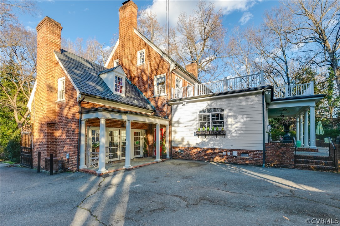 5805 River Road Richmond, VA 23226 - Photo 40 of 47 a view of a house with a park and iron fence