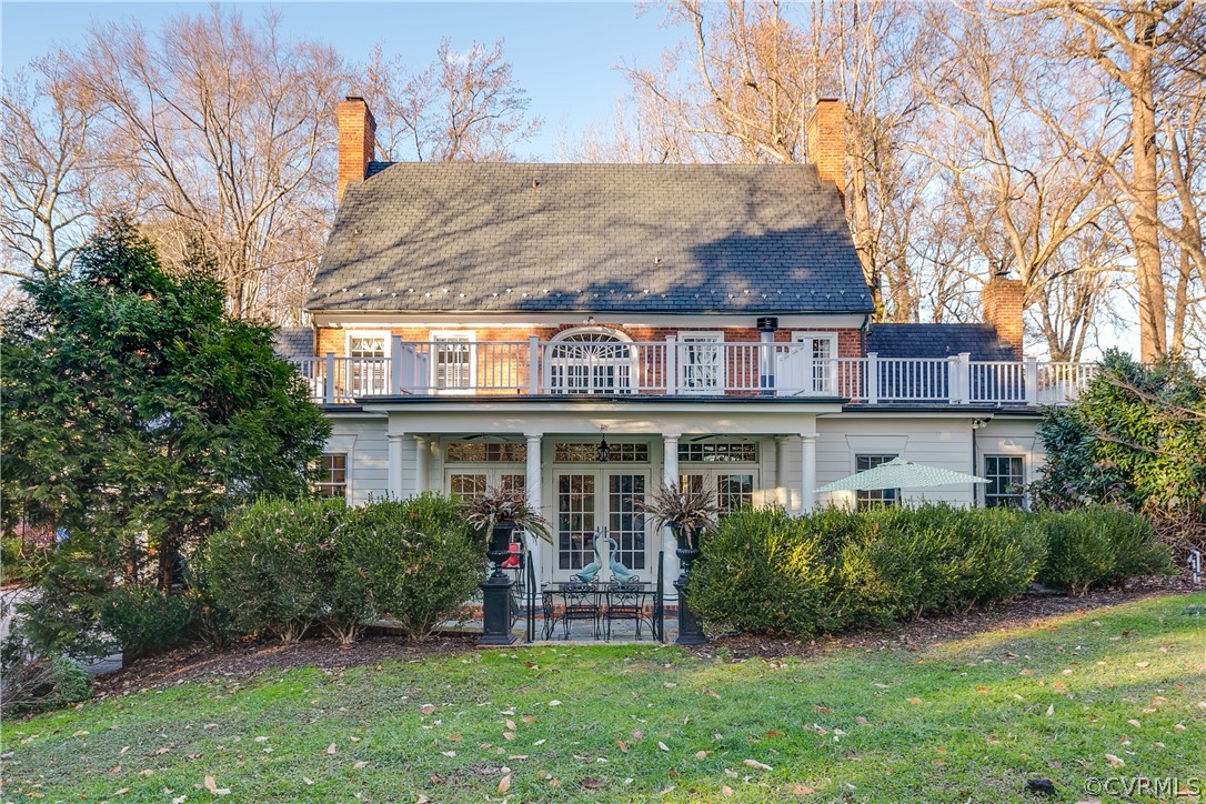 5805 River Road Richmond, VA 23226 - Photo 45 of 47 a view of a house with a yard and potted plants