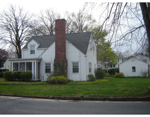 23 Haller Street Springfield, MA 01151 - Photo 1 of 1 a view of a house with a yard and large trees