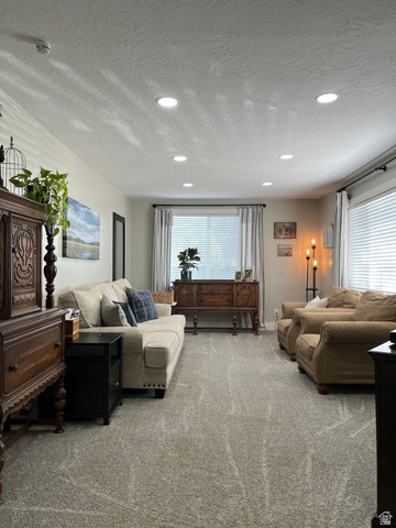 558 North N Cres Road Roosevelt, UT 84066 - Photo 6 of 31 Recessed lighting illuminates this room featuring wall-to-wall carpeting and neutral wall tones
