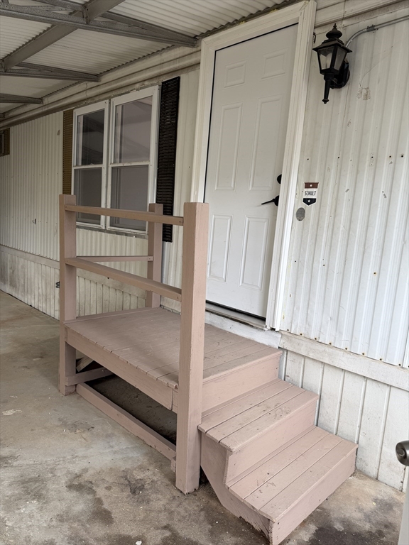 181 Boston Post Road East, Unit 26 Marlborough, MA 01752 - Photo 13 of 14 a view of staircase with white walls and a window