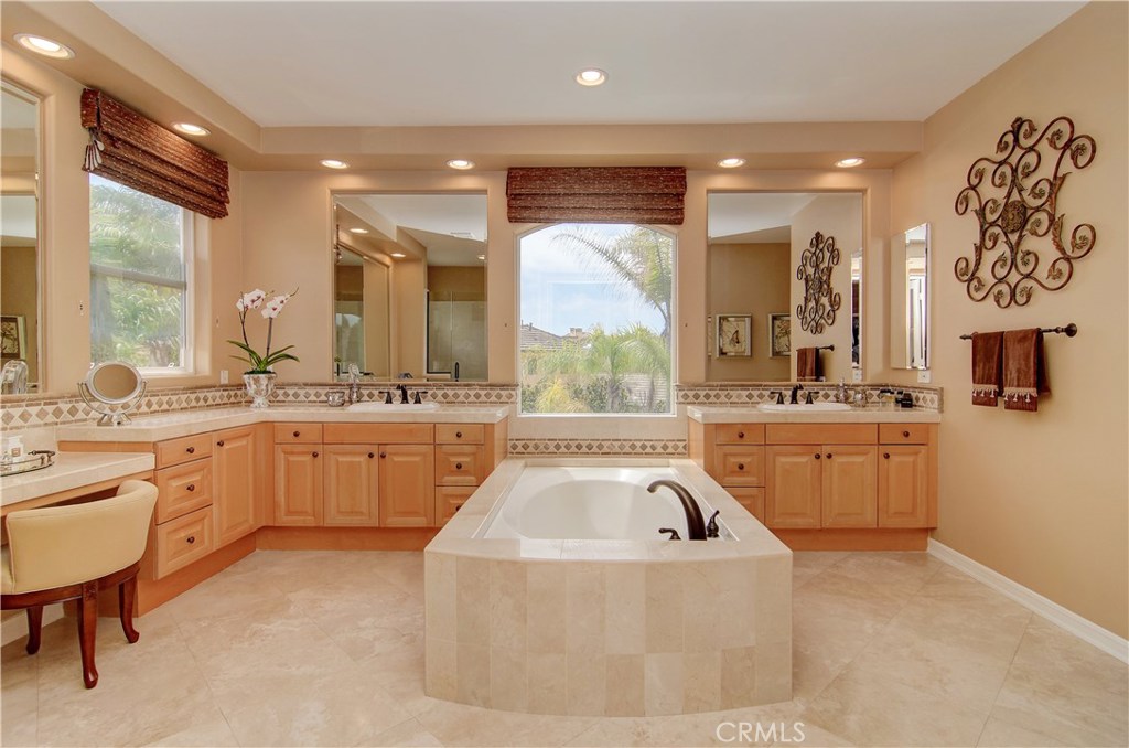 21 Asilomar Road Laguna Niguel, CA 92677 - Photo 12 of 35 a large white bathroom with a large window sink and double vanity