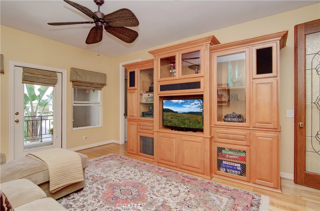 21 Asilomar Road Laguna Niguel, CA 92677 - Photo 13 of 35 a living room with fireplace furniture and a window