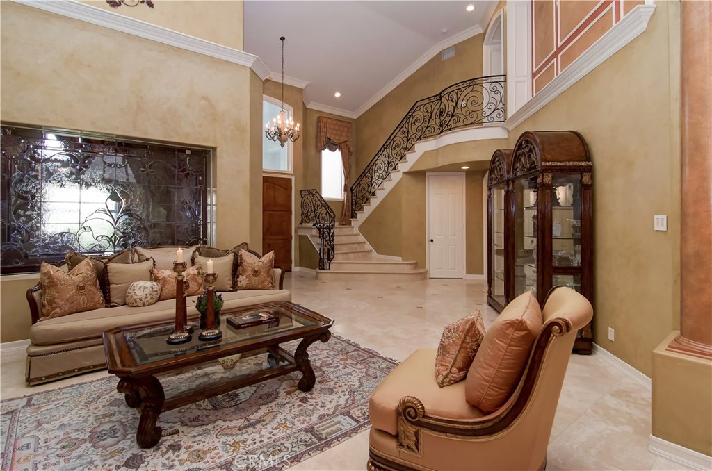 21 Asilomar Road Laguna Niguel, CA 92677 - Photo 18 of 35 a living room with furniture a lamp and a window