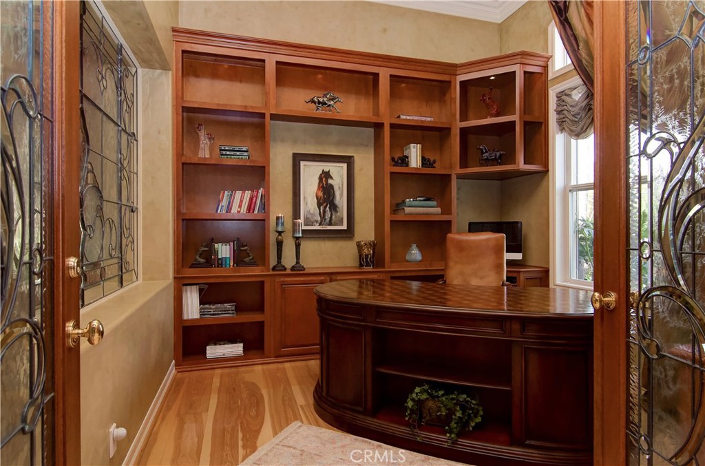 21 Asilomar Road Laguna Niguel, CA 92677 - Photo 21 of 35 a kitchen with stainless steel appliances a stove and a bookshelf