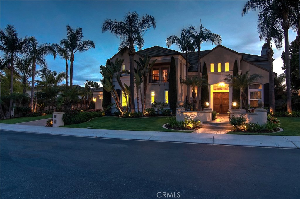 21 Asilomar Road Laguna Niguel, CA 92677 - Photo 24 of 35 a view of a building and a yard in front of it