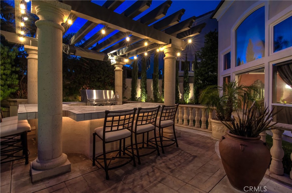 21 Asilomar Road Laguna Niguel, CA 92677 - Photo 27 of 35 a view of a chairs and tables in patio