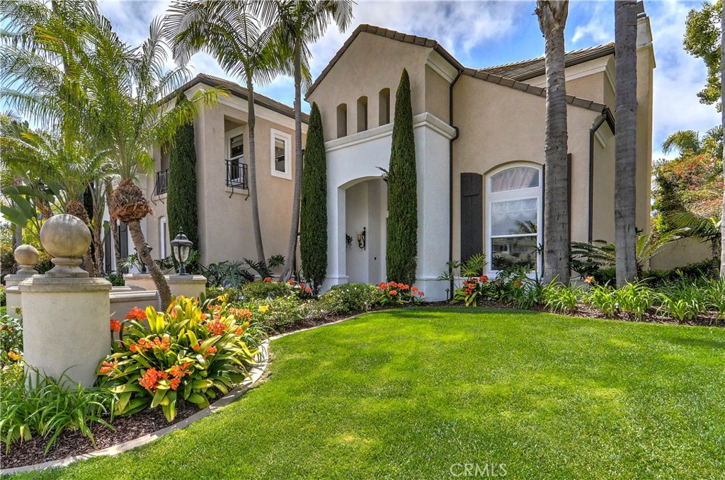 21 Asilomar Road Laguna Niguel, CA 92677 - Photo 33 of 35 a front view of a house with a garden
