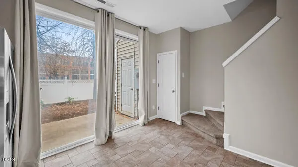 a view of entryway with wooden floor