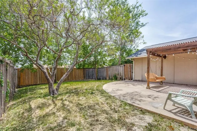 a backyard of a house with seating space