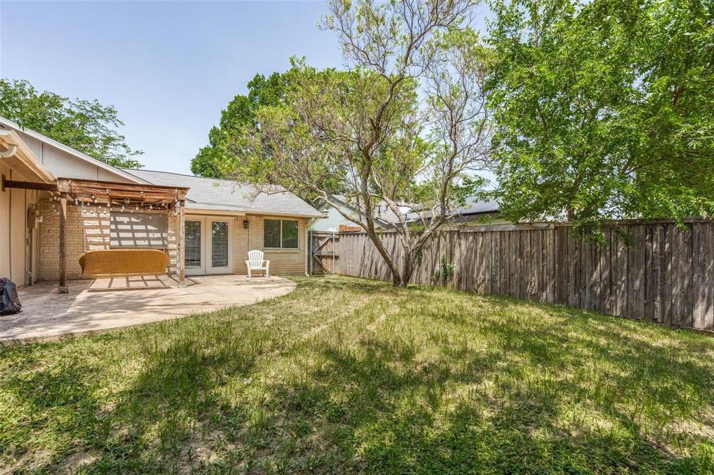 1708 Hendrick Drive Plano, TX 75074 - Photo 21 of 23 a view of a house with backyard and sitting area