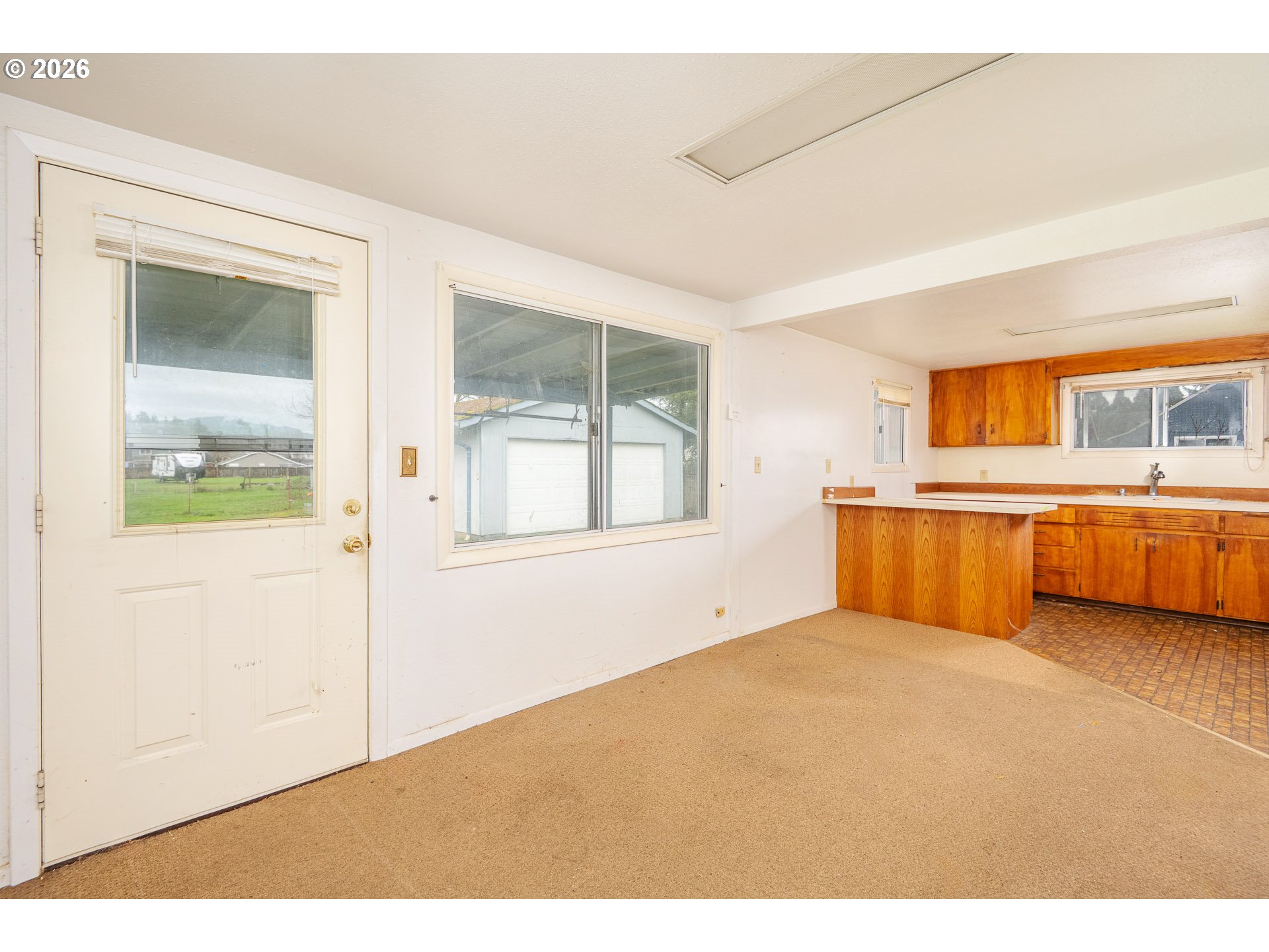 875 South 43rd Street Springfield, OR 97478 - Photo 11 of 22 a view of an empty room with a window