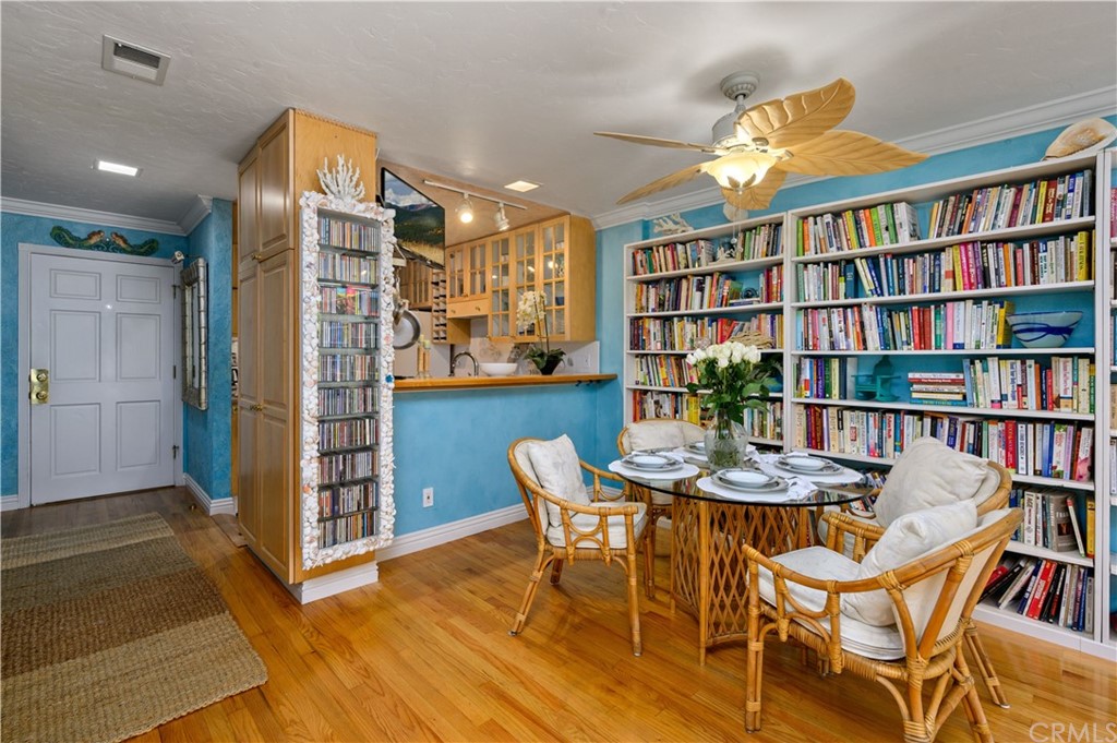 4140 Workman Road, Unit 18 Whittier, CA 90601 - Photo 11 of 35 a dining room with furniture and wooden floor