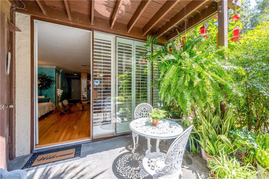 4140 Workman Road, Unit 18 Whittier, CA 90601 - Photo 12 of 35 a view of porch with furniture and a potted plant