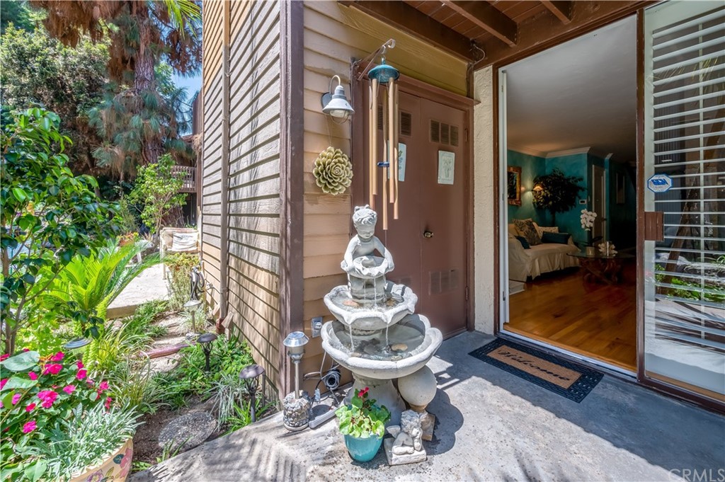 4140 Workman Road, Unit 18 Whittier, CA 90601 - Photo 13 of 35 a front view of a house with outdoor seating