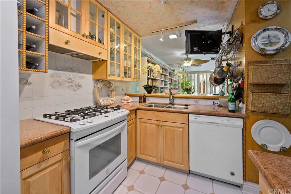 4140 Workman Road, Unit 18 Whittier, CA 90601 - Photo 2 of 35 a kitchen with a stove and a sink