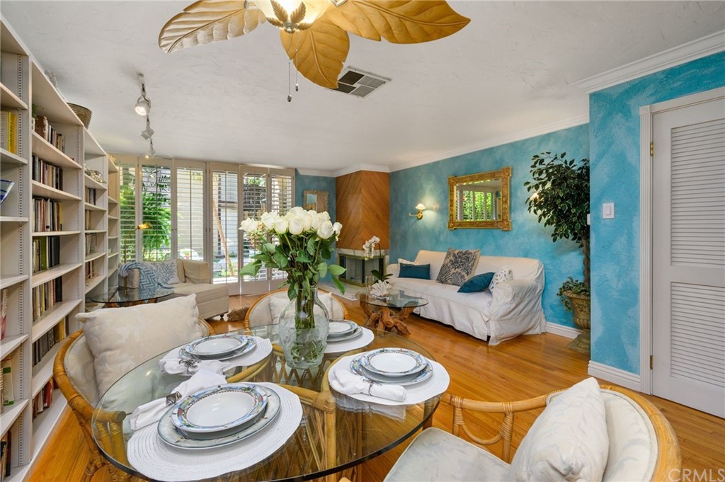 4140 Workman Road, Unit 18 Whittier, CA 90601 - Photo 7 of 35 a living room with furniture and a lamp