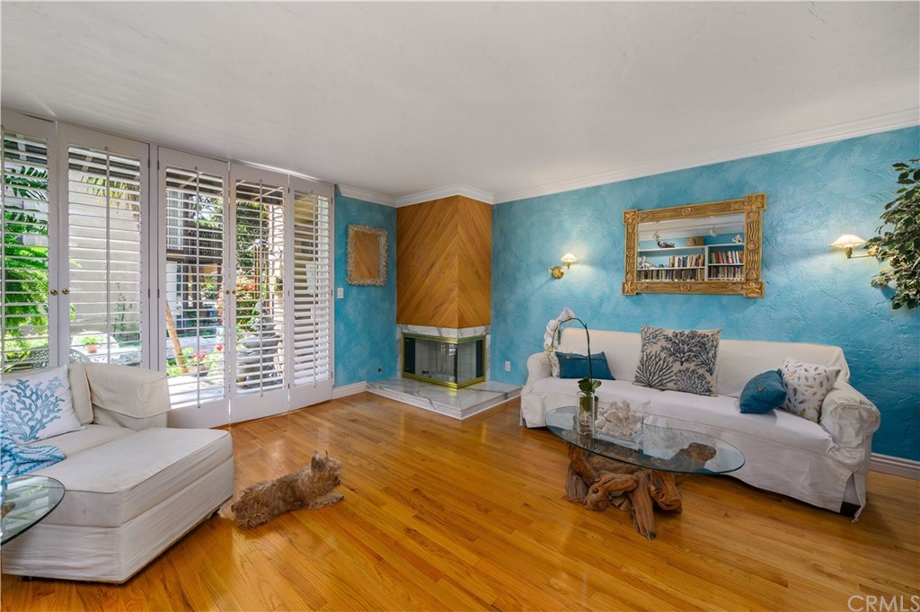4140 Workman Road, Unit 18 Whittier, CA 90601 - Photo 8 of 35 a living room with furniture and a lamp