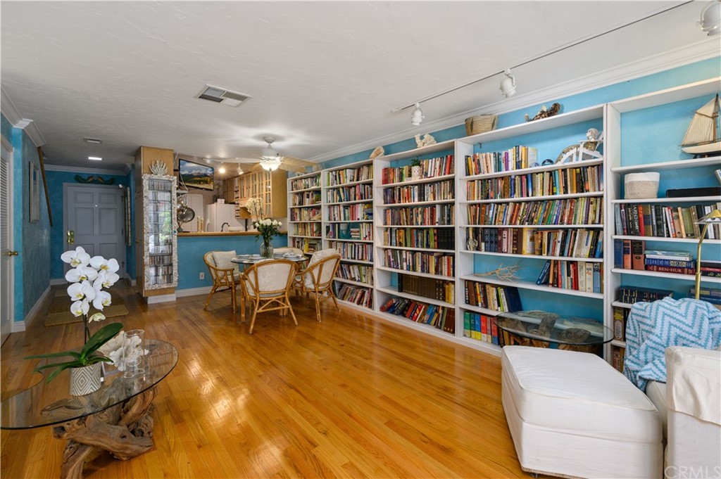 4140 Workman Road, Unit 18 Whittier, CA 90601 - Photo 9 of 35 a living room with furniture and a book shelf