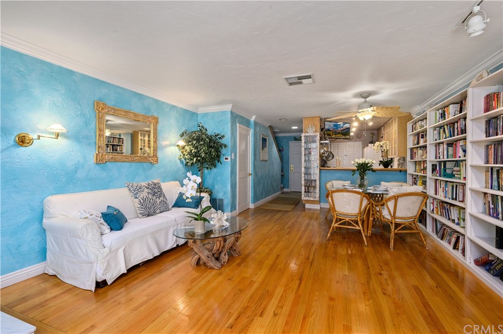 4140 Workman Road, Unit 18 Whittier, CA 90601 - Photo 10 of 35 a living room with furniture and a wooden floor