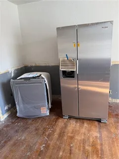 a utility room with washer and dryer