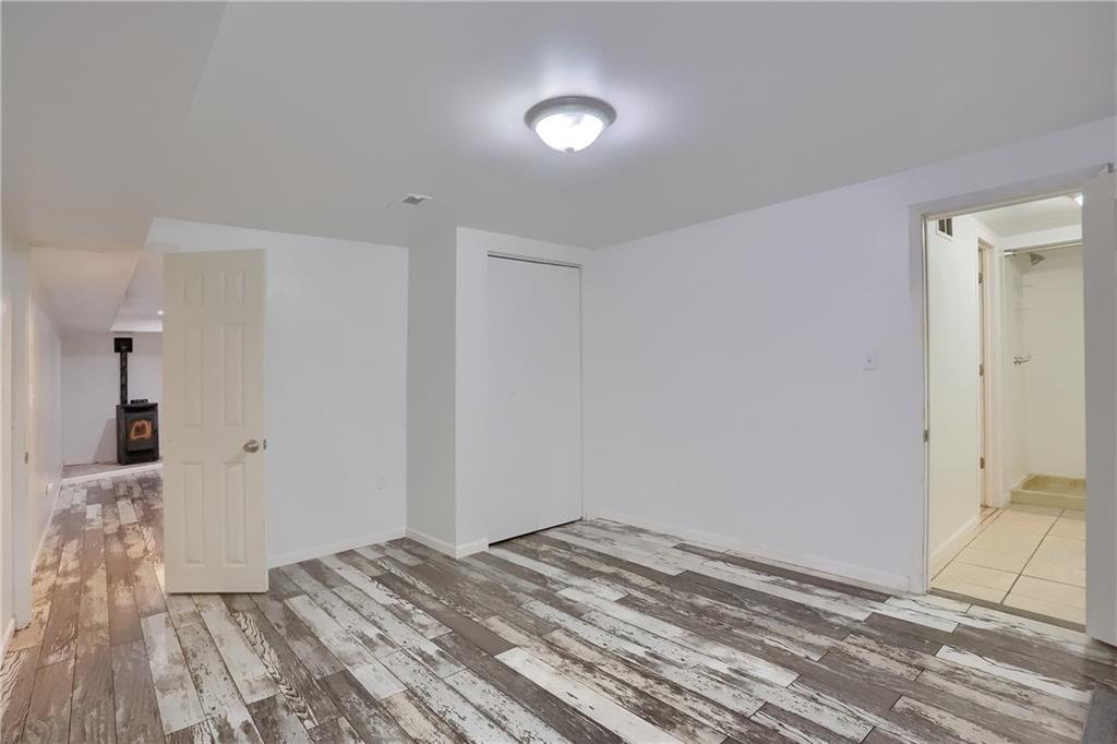 138 Crissinger Road Greensburg, PA 15601 - Photo 21 of 28 a view of a room with wooden floor and bathroom