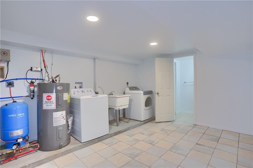 138 Crissinger Road Greensburg, PA 15601 - Photo 23 of 28 a view of a storage & utility room with two washing machine