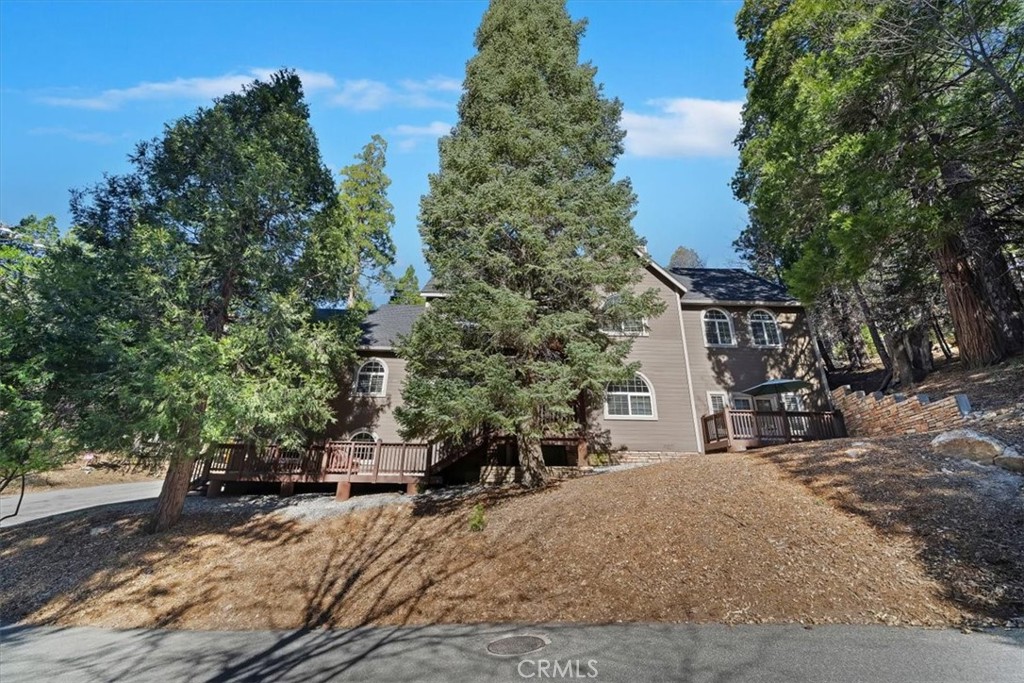 27312 Little Bear Road Lake Arrowhead, CA 92352 - Photo 1 of 47 a view of a house with a yard