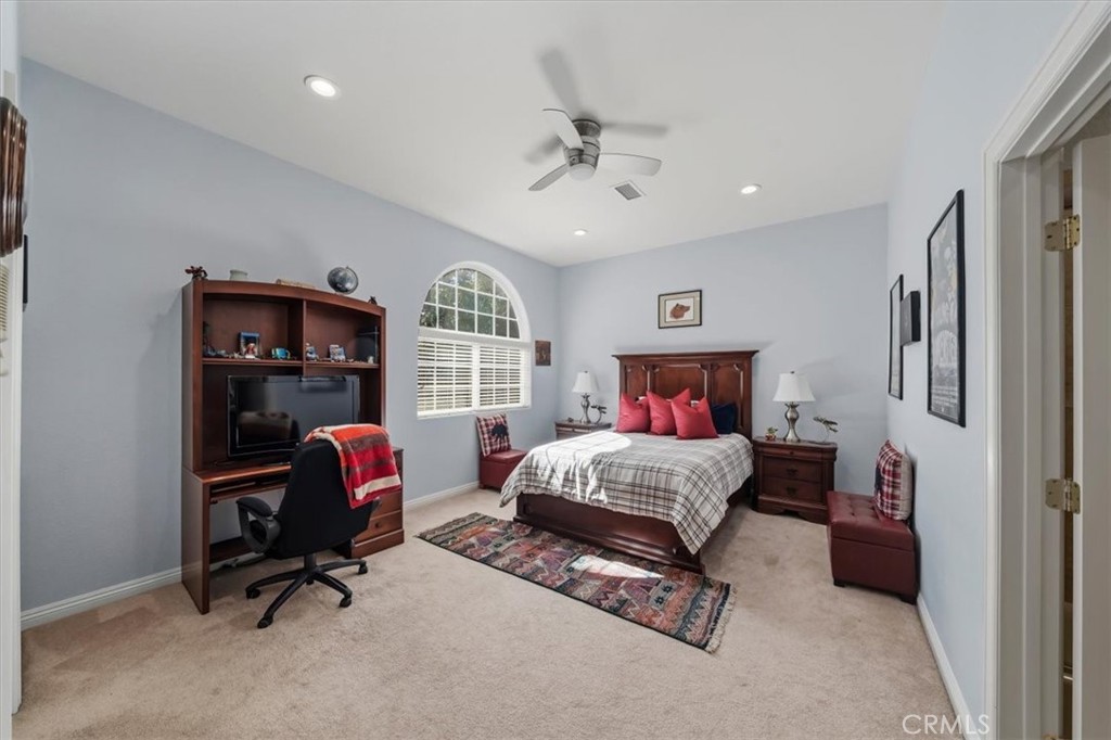 27312 Little Bear Road Lake Arrowhead, CA 92352 - Photo 25 of 47 a bedroom with bed and a window