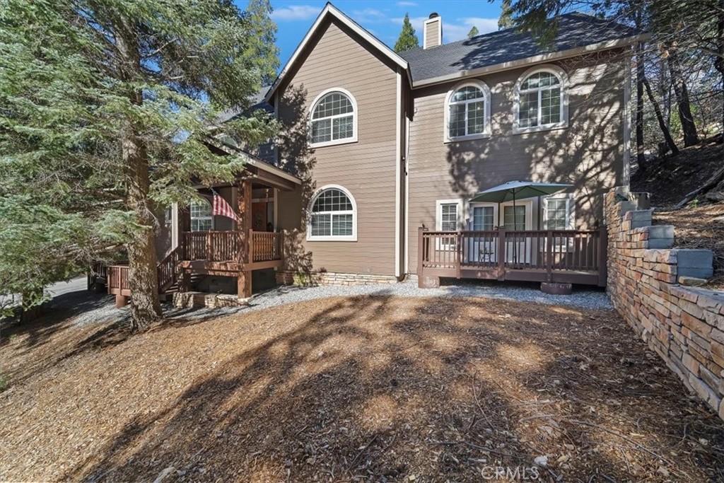 27312 Little Bear Road Lake Arrowhead, CA 92352 - Photo 3 of 47 a view of a house with a yard