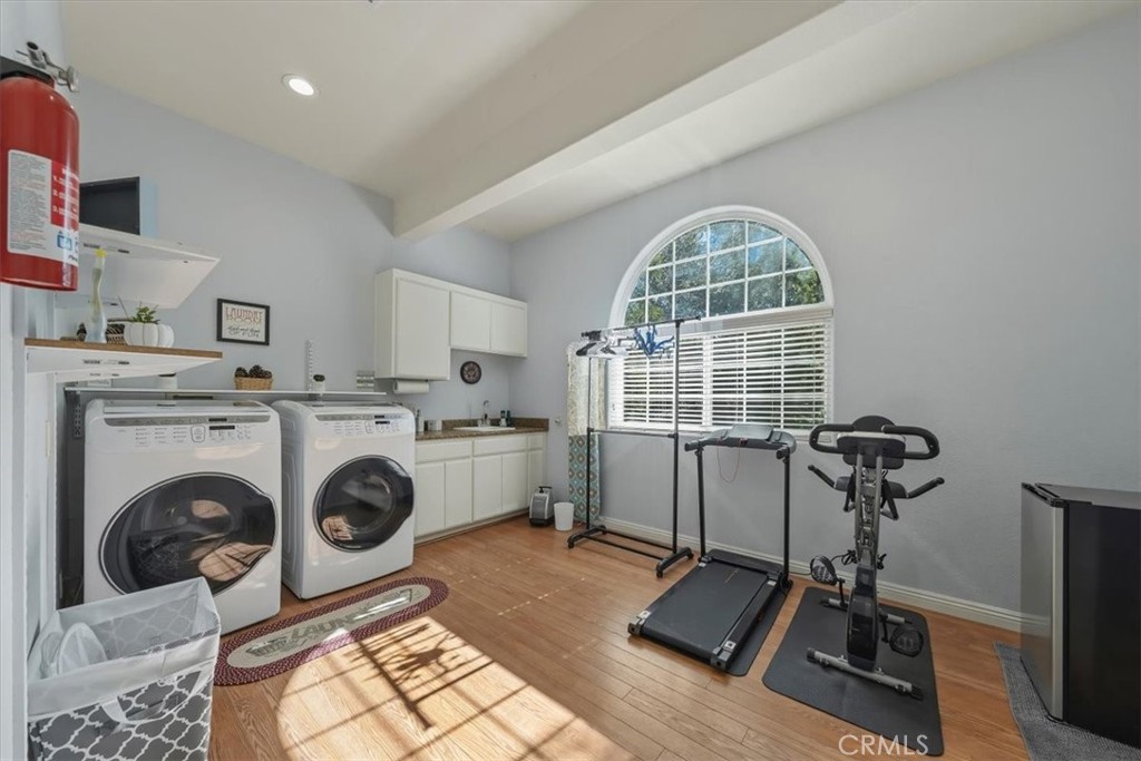 27312 Little Bear Road Lake Arrowhead, CA 92352 - Photo 37 of 47 a view of a room with gym equipment