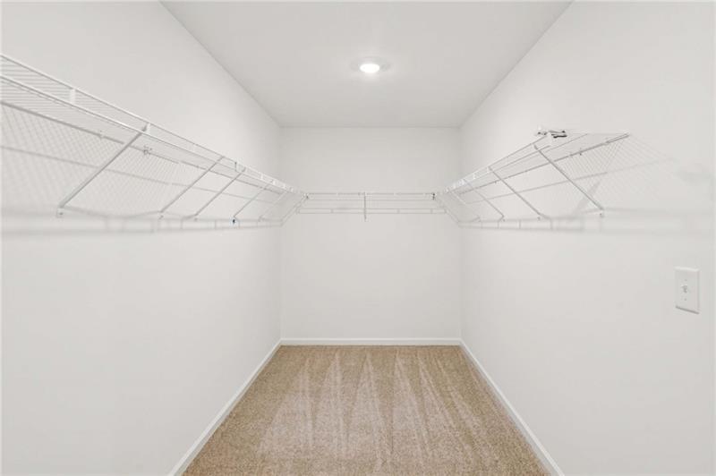 240 Silverleaf Trail Bethlehem, GA 30620 - Photo 25 of 35 a view of a room with racks on the wall