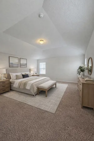 a bedroom with bed and window