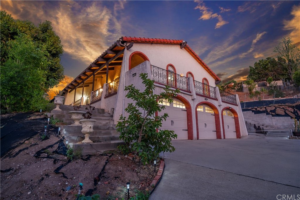 10280 Balmoral Court Riverside, CA 92503 - Photo 1 of 1 a front view of a house with a yard