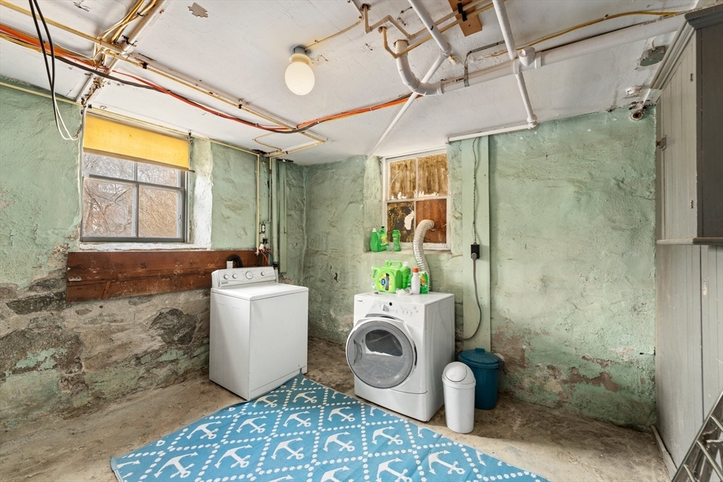 52 Underwood Street Fall River, MA 02720 - Photo 38 of 42 a bathroom with a sink mirror toilet and shower