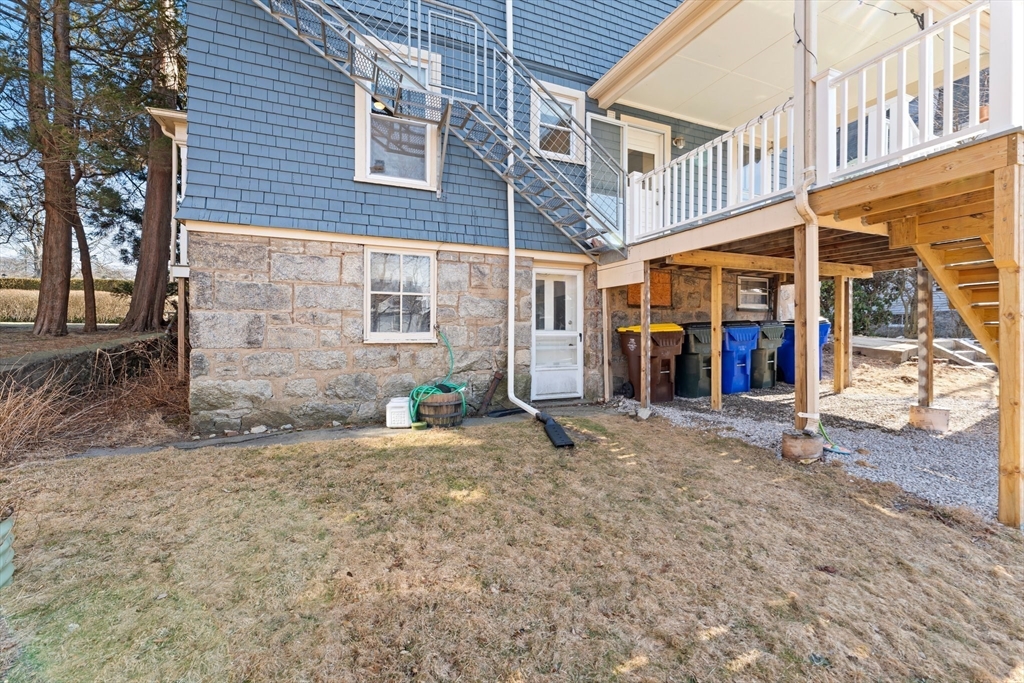 52 Underwood Street Fall River, MA 02720 - Photo 41 of 42 a view of a house with a patio and a yard