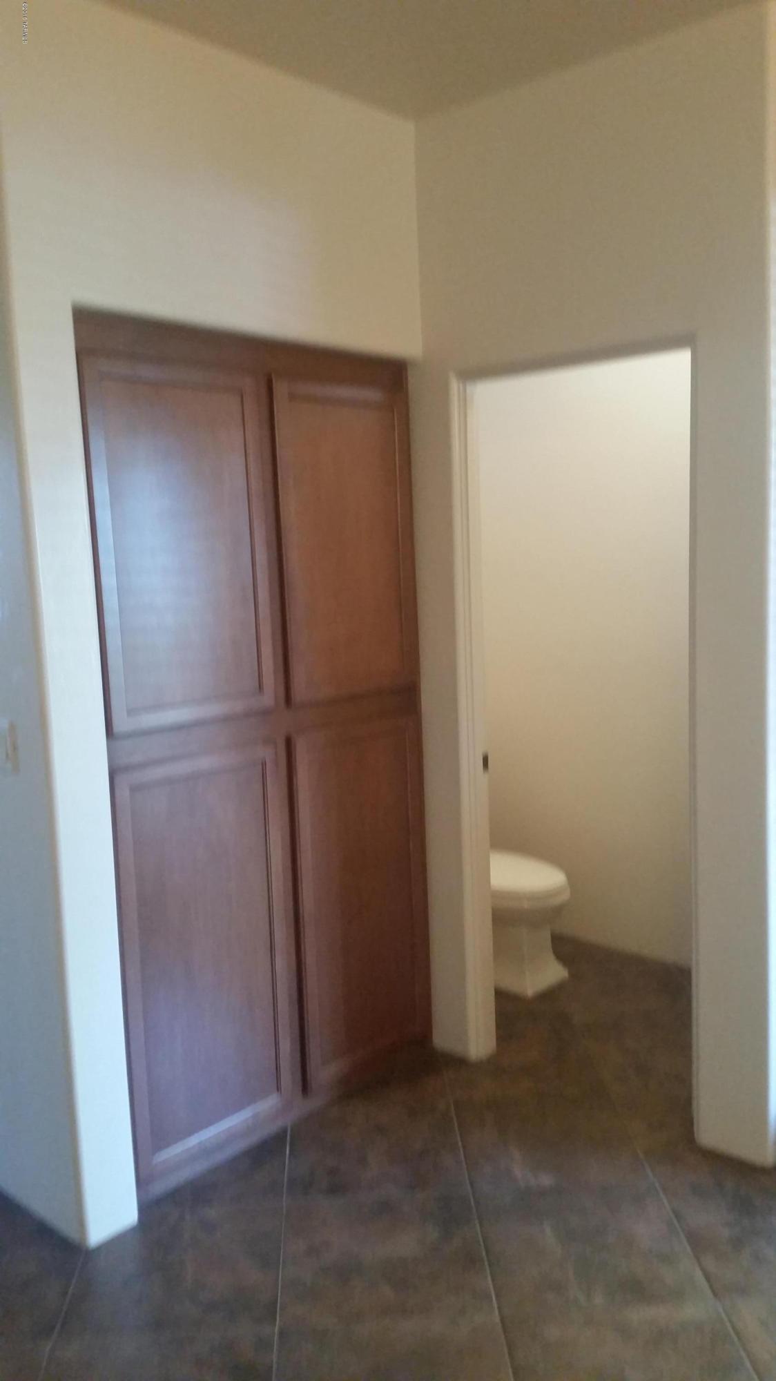 478 East Cedarvale Road Tucson, AZ 85704 - Photo 23 of 39 a bathroom with a toilet