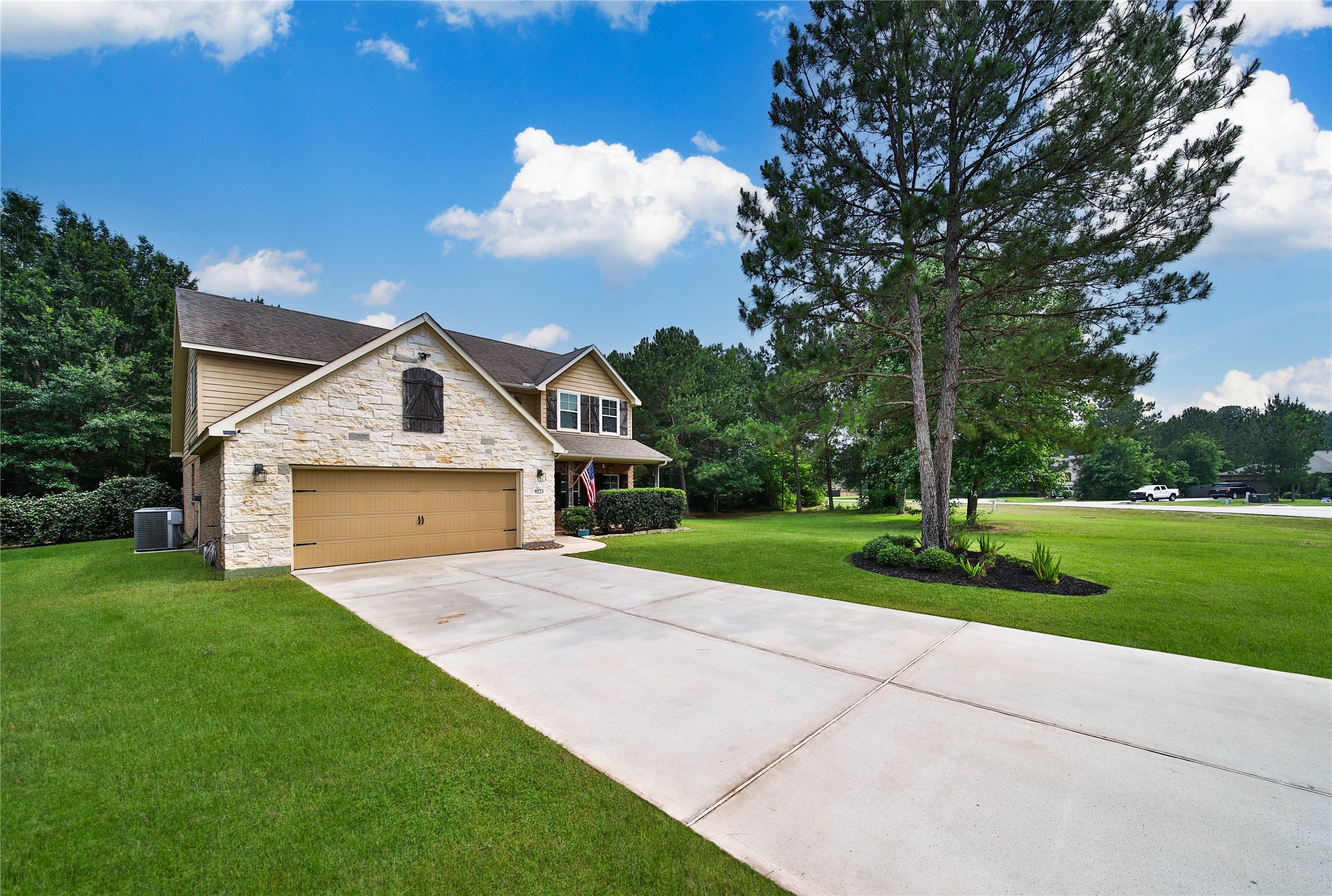 9223 Wapiti Trail Conroe, TX 77303 - Photo 5 of 45 a front view of a house with yard