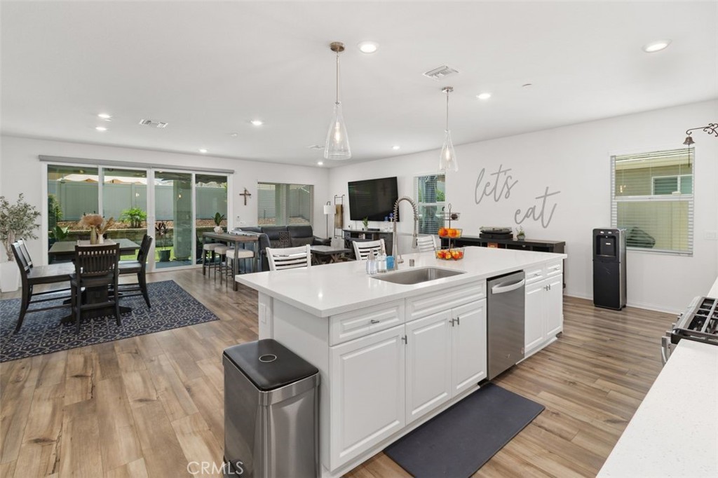 7598 Orangebrook Cove Riverside, CA 92507 - Photo 15 of 45 Open Space Kitchen overlooking the Formal Dining Area
