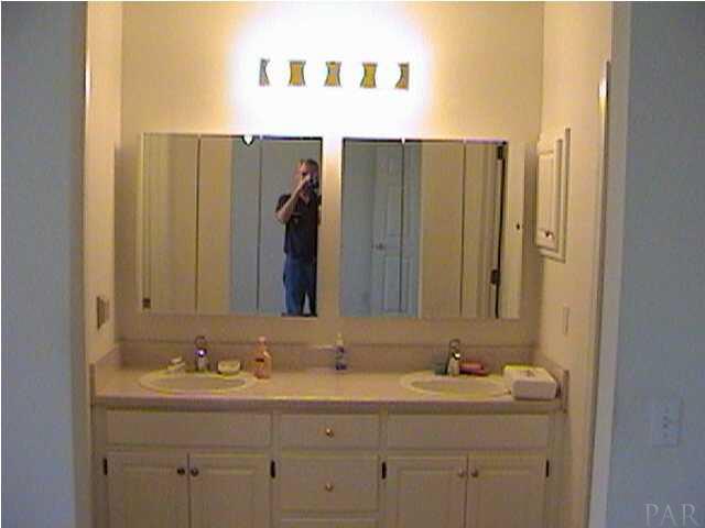 6843 Cedar Ridge Circle Milton, FL 32570 - Photo 8 of 11 Vanity/Dressing Area in Master Bath. To right is water closet/tub