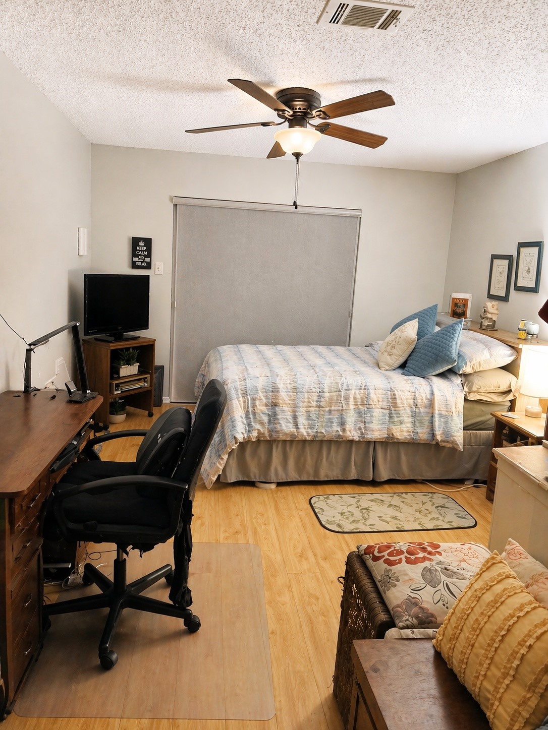 3546 Ocee Street Houston, TX 77063 - Photo 11 of 22 a bedroom with a bed and a desk