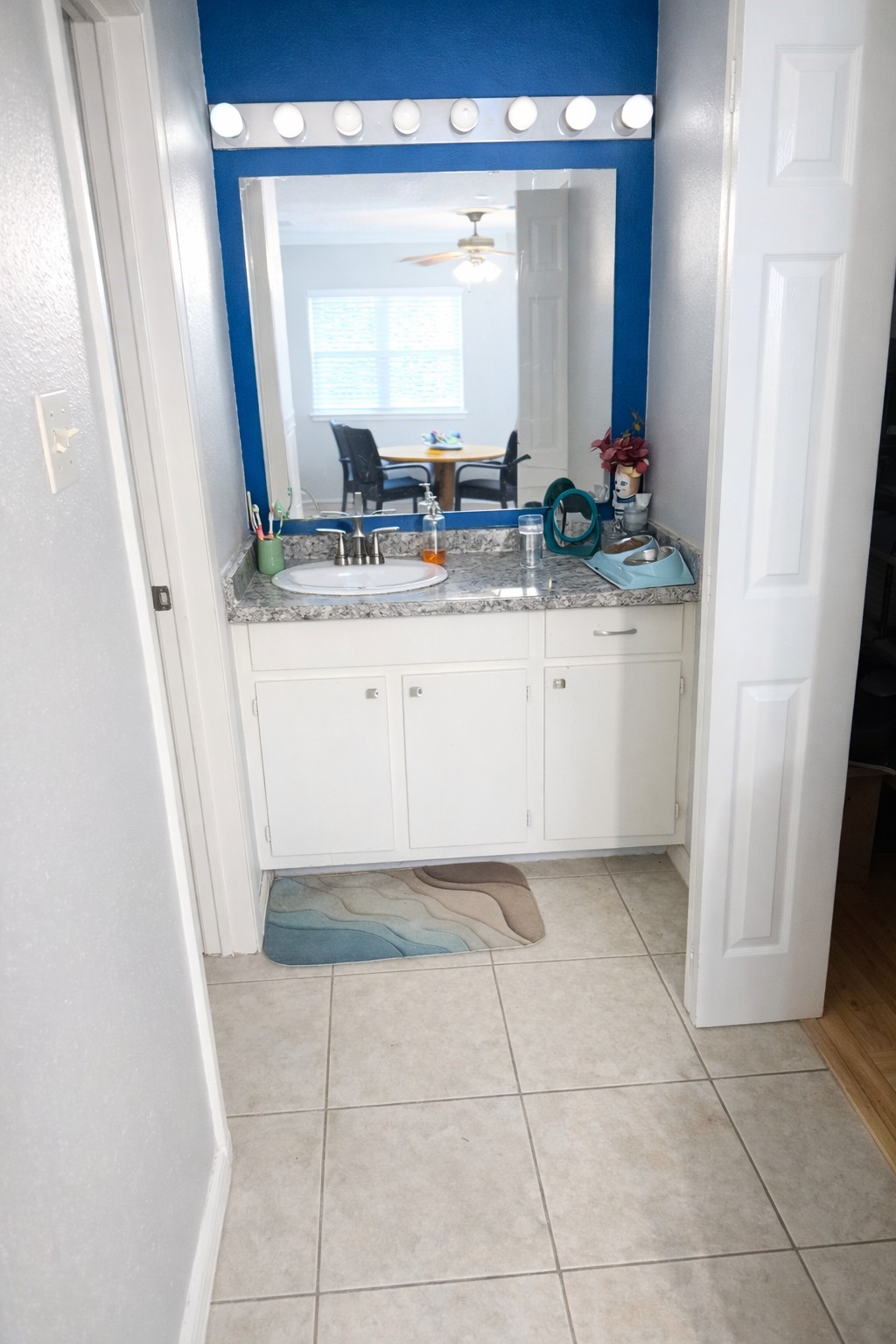 3546 Ocee Street Houston, TX 77063 - Photo 16 of 22 a bathroom with a sink and a mirror